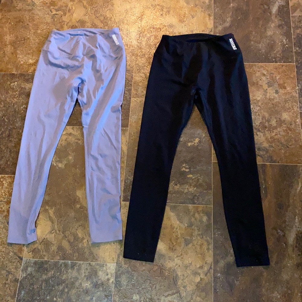 Light purple and black leggings! Both size medium!